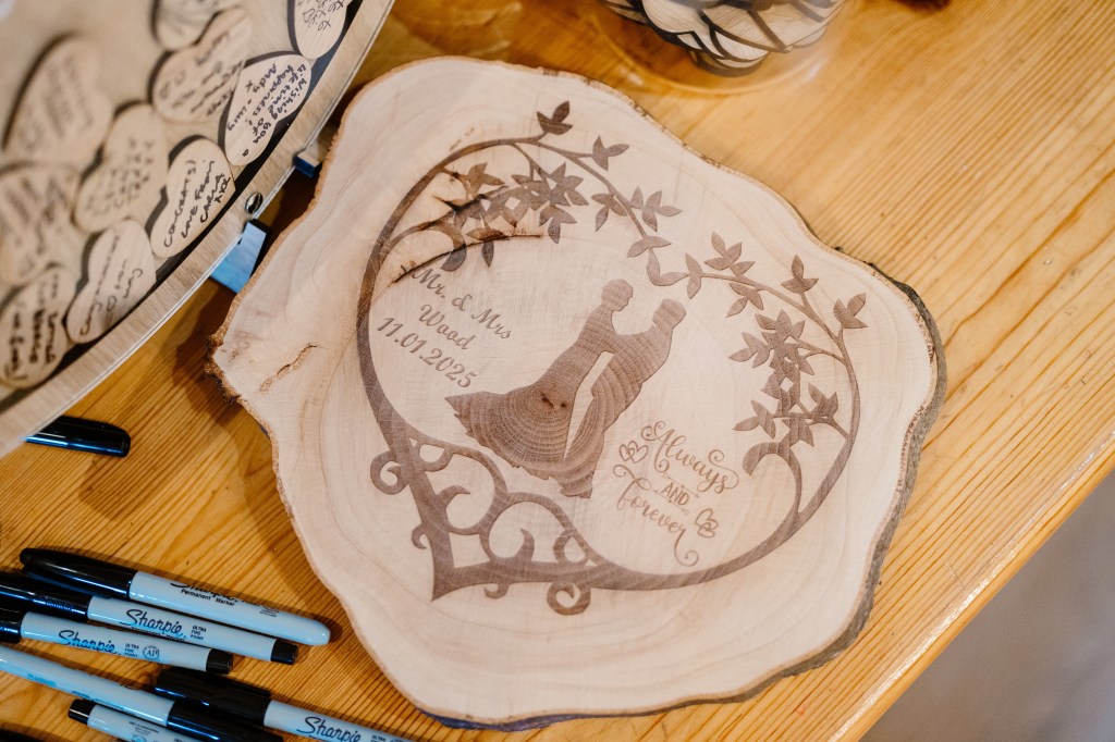 Rustic wedding table setting featuring engraved wooden place name tags, handmade in the UK. Wedding Photo Location -Priston Mill, Bath, Somerset
